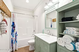 225 NE 54th St, Oak Island, NC 28465 - Photo 23