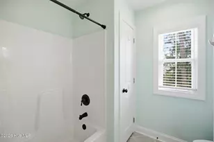 101 NE 33rd St, Oak Island, NC 28465 - Photo 29