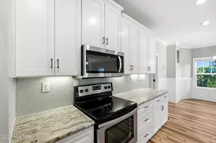 218 NE 76th St, Oak Island, NC 28465 - Photo 17