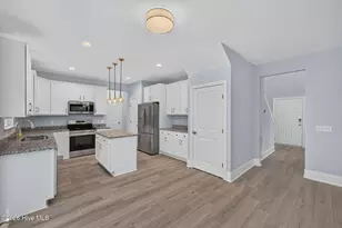 163 NE 2nd St, Oak Island, NC 28465 - Photo 15