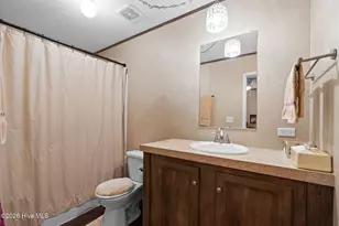 211 NE 76th St, Oak Island, NC 28465 - Photo 27