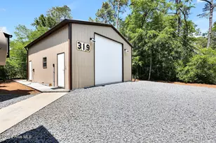 319 NE 42nd St, Oak Island, NC 28465 - Photo 45