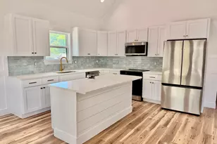 106 NW 23rd St, Oak Island, NC 28465 - Photo 5