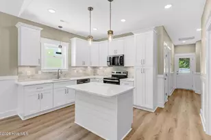 225 NE 75th St, Oak Island, NC 28465 - Photo 7