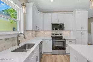 225 NE 75th St, Oak Island, NC 28465 - Photo 9