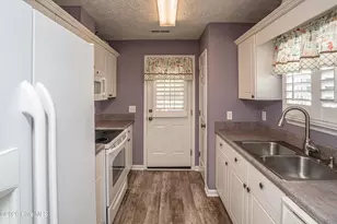130 NE 11th St, Oak Island, NC 28465 - Photo 19