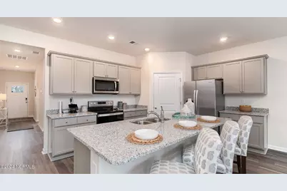 1297 Woodhouse Drive NW, Ash, NC 28420 - Photo 5