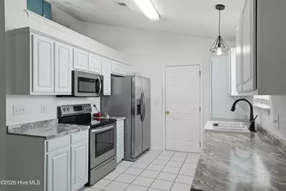 7404 Huckleberry Lane SW, Sunset Beach, NC 28468 - Photo 13