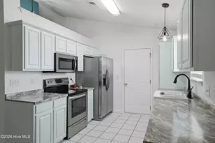 7404 Huckleberry Ln SW, Sunset Beach, NC 28468 - Photo 13