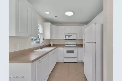 123 NE 30th Street, Oak Island, NC 28465 - Photo 19