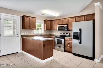 1099 Woodcrest Road, Southport, NC 28461 - Photo 7