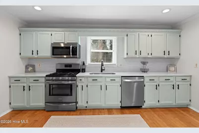 316 NE 58th Street, Oak Island, NC 28465 - Photo 9