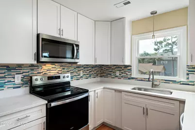228 NE 52nd Street, Oak Island, NC 28465 - Photo 25