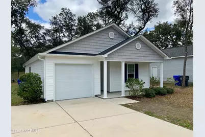 126 NW 8th Street, Oak Island, NC 28465 - Photo 1