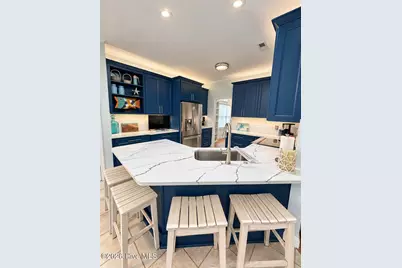301 Wisteria Way, Caswell Beach, NC 28465 - Photo 5