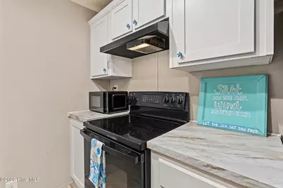 8990 Bonaparte Drive SW, Sunset Beach, NC 28468 - Photo 21