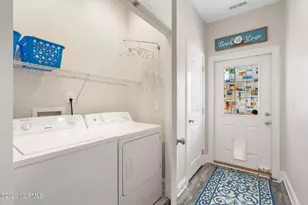 130 NW 23rd St, Oak Island, NC 28465 - Photo 25