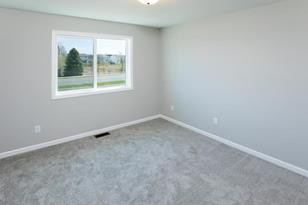 7687 MacKenzie Ave NE - Photo 5