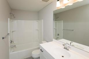 7687 MacKenzie Ave NE - Photo 3