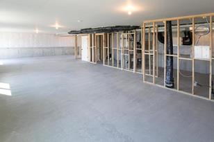 7687 MacKenzie Ave NE - Photo 7