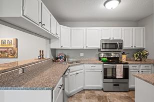 1560 Helmo Ave N - Photo 5