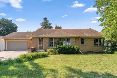 1142 Sandhurst Drive W, Roseville, MN 55113 - Photo 1