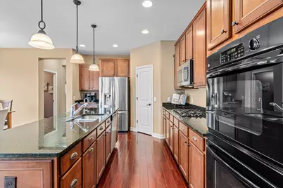 10723 Maple Boulevard, Woodbury, MN 55129 - Photo 9