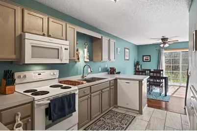 8606 Quarry Ridge Lane #J, Woodbury, MN 55125 - Photo 13