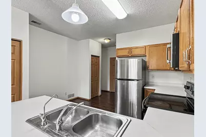 665 Kingfisher Lane #E, Woodbury, MN 55125 - Photo 5