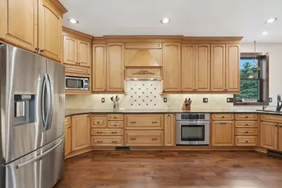 10057 Raleigh Court, Woodbury, MN 55129 - Photo 7