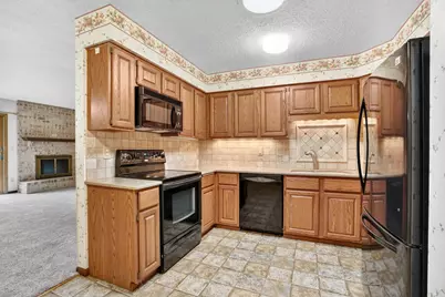 7055 Robinwood Trail, Woodbury, MN 55125 - Photo 7