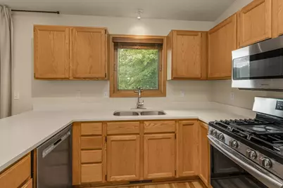4693 Heather Ridge Road N, Oakdale, MN 55128 - Photo 11