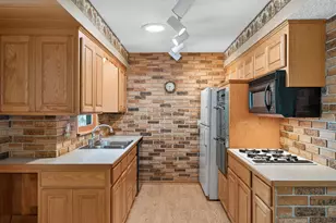 11760 Sand Creek Dr NW, Coon Rapids, MN 55448 - Photo 9