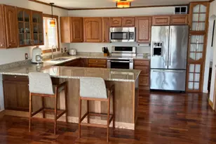 318 Riverside Blvd, Amery, WI 54001 - Photo 1