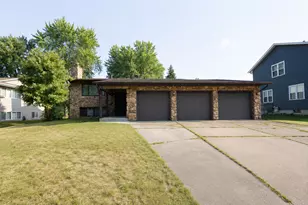 7797 Woodpark Blvd, Woodbury, MN 55125 - Photo 1