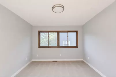 7797 Woodpark Boulevard, Woodbury, MN 55125 - Photo 13