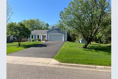 7765 Woodpark Boulevard, Woodbury, MN 55125 - Photo 1