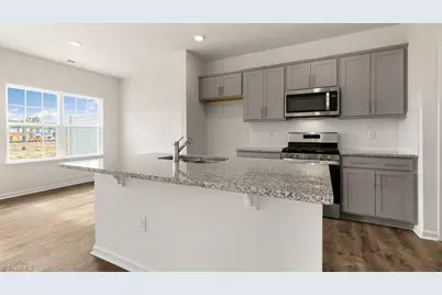 7035 Eclipse Trail, Whitsett, NC 27377 - Photo 7