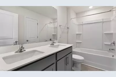 7035 Eclipse Trail, Whitsett, NC 27377 - Photo 19