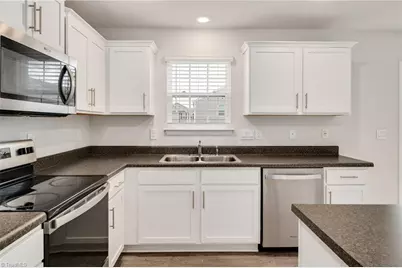 6884 Keeneland Drive, Whitsett, NC 27377 - Photo 13