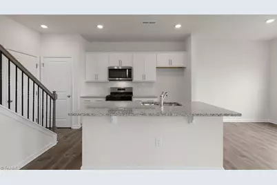 7031 Eclipse Trail, Whitsett, NC 27377 - Photo 11