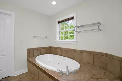 8916 Grove Park Drive, Oak Ridge, NC 27310 - Photo 17