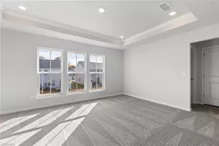 1022 Poets Walk Rd, Whitsett, NC 27377 - Photo 13