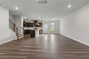 1022 Poets Walk Rd, Whitsett, NC 27377 - Photo 7