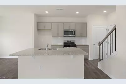 7153 Royal Ascot Drive, Whitsett, NC 27377 - Photo 3