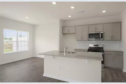 7153 Royal Ascot Drive, Whitsett, NC 27377 - Photo 13