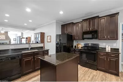 6506 Donahue Drive, Whitsett, NC 27377 - Photo 11