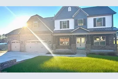 7731 Maple Pond Drive, Oak Ridge, NC 27310 - Photo 1