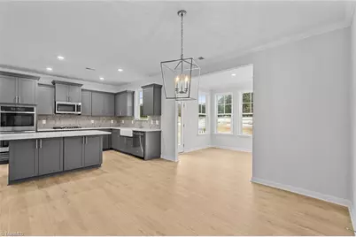 8605 Lemur Lane, Summerfield, NC 27358 - Photo 15