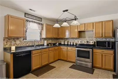 3907 SE Whispering Willows Drive, Greensboro, NC 27406 - Photo 9